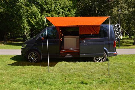 It seems there is nothing you can't do when you have one of these vans. Wild Earth Sun canopy awning for VW Camper Van motorhome 2 ...