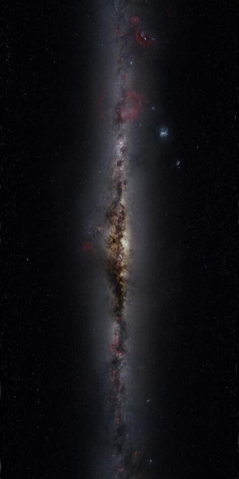 majestic nebulae and stars of our milky way galaxy stretch across this panoramic image of the