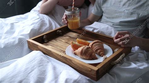 Young Couple Enjoying Romantic Breakfast In Bed Stock Video Footage