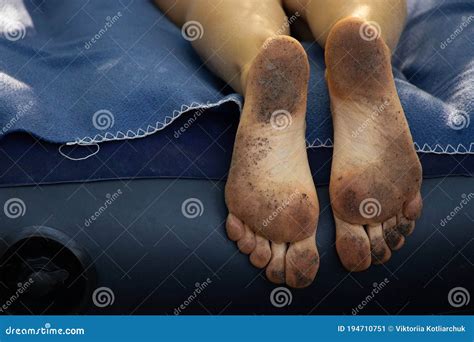 Dirty Feet In The Ground Of A Barefoot Girl Close Up Stock Image