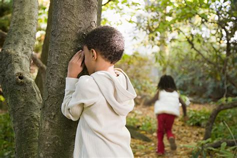 Children Playing Hide And Seek Stock Photo Download Image Now Istock
