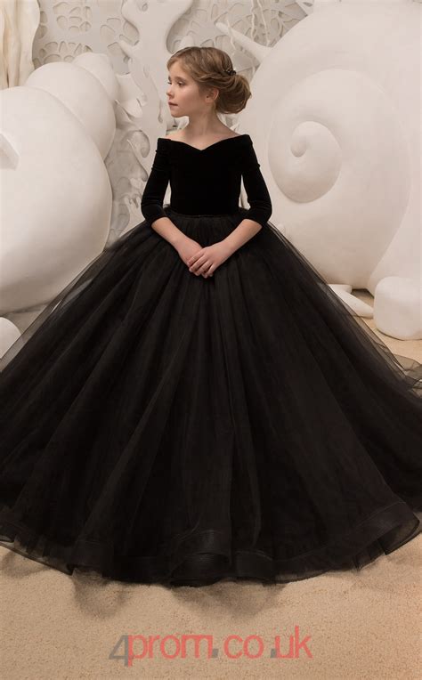 The upper part of the bodice is enriched with stones. Scalloped 3/4 Length Sleeve Black Kids Prom Dresses CHK037 ...