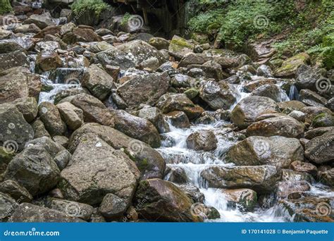 Water Flowing Over Rocks In A Stream Stock Photo Image Of Waterfall