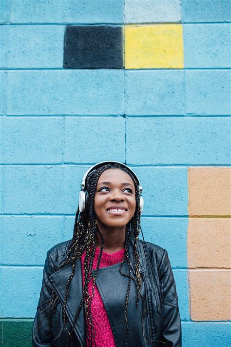 Happy Girl Listening To Music With Headphones By Stocksy Contributor