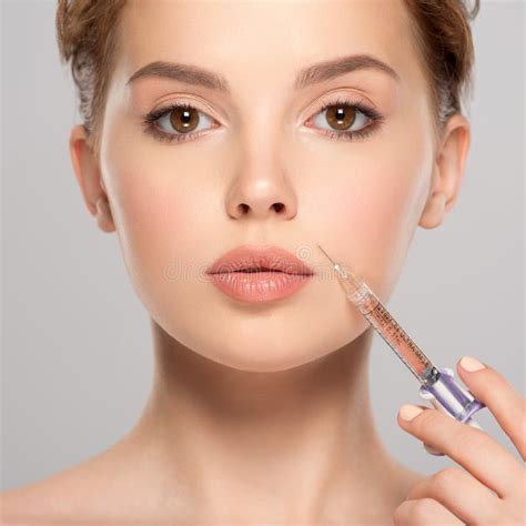 Injection Of Botox To The Face Of Beautiful Woman Stock Image Image