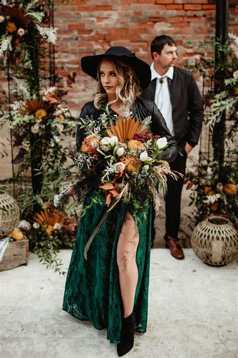 Black emerald green wedding bouquets. Tones of emerald and sage green. Striking, sleek white ...
