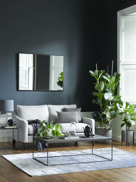 The trendy design of this spacious living room gives you some more suggestions about the choice of colours in your rooms with grey colour palette. What Colour Walls Go With Charcoal Grey Sofa ...