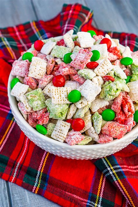 This quick and easy christmas puppy chow recipe will be a hit! Reindeer Chow - A Festive Christmas Puppy Chow - The Love Nerds