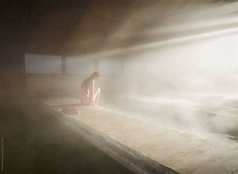 View Woman Relaxing At Japanese Hot Springs And Spa With Steam By