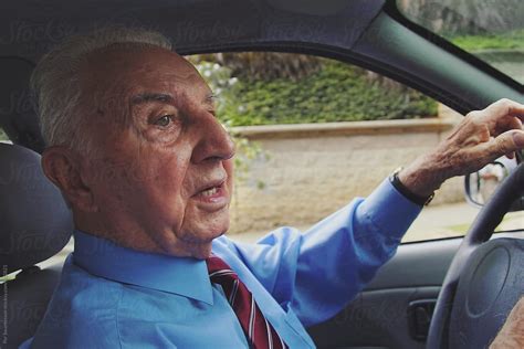 85 Year Old Healthy Man Driving His Car By Stocksy Contributor Per Images Stocksy