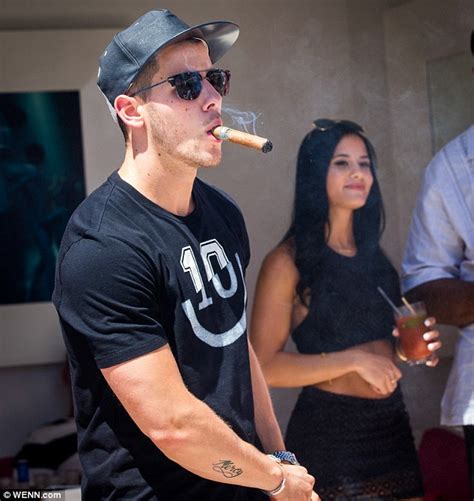 Nick Jonas Parties And Puffs On Cigars In Las Vegas After Olivia Culpo