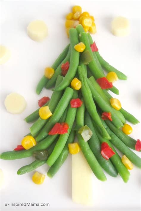 The holidays seem to be when my kids (and myself!) eat the least healthy foods. A Christmas Tree of Vegetables for Kids • B-Inspired Mama