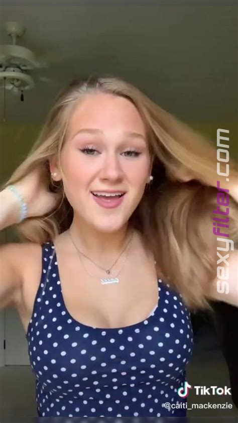 Cute Caiti Mackenzie Shows Cleavage In Polka Dot Top And Bouncing Boobs