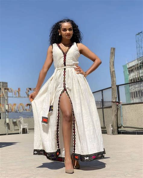 elegant in her habesha dress 🌻💚💛 🌻 ethiopian clothing ethiopian dress ethiopian traditional