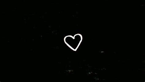 All black background with heart. Little heart - Royalty Free Video