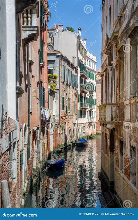 Tiny Venice Old Town Channel With Beautiful Reflections On The Water