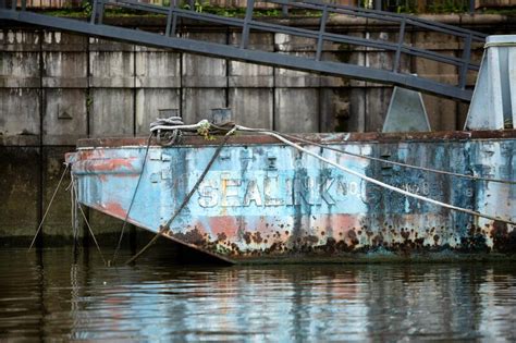 View Of A Rusty Old Barge Moored To The Docks Editorial Stock Image