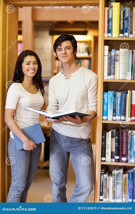 Portrait Of Students Holding Books Royalty Free Stock Images Image