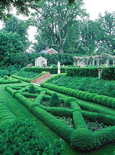 A knot garden is a garden of very formal design in a square frame, consisting of a variety of aromatic plants and culinary herbs including germander, marjoram, thyme, southernwood, lemon balm, hyssop, acanthus, mallow, chamomile, rosemary, calendulas, violas and santolina. Boxwood knot gardens.... Sigh | Boxwood garden, Parterre garden, Formal garden design