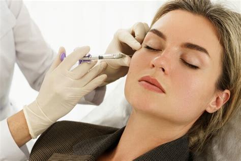 Premium Photo Female Client During Facial Filler Injections In