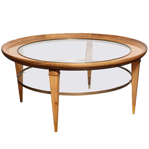 A Round Two Tiered Rosewood Coffee Table With Glass Top At 1stdibs