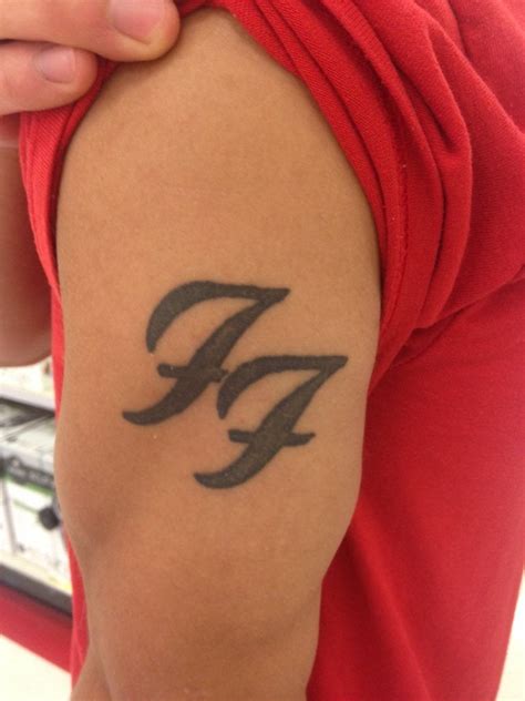 The colour and the shape is the second studio album. My friend's awesome Foo Fighter tattoo! Thought I would share with you guys. : Foofighters