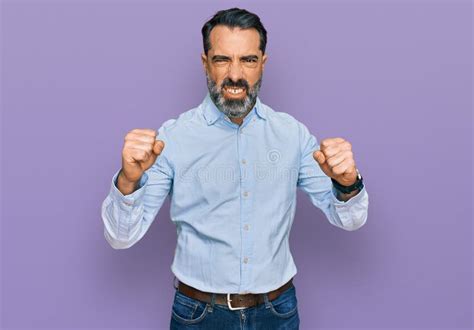 Middle Aged Man With Beard Wearing Business Shirt Angry And Mad Raising