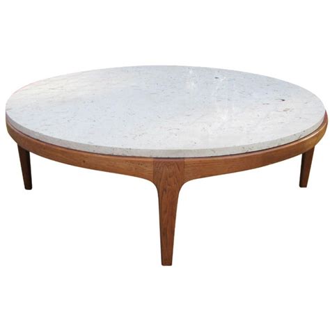 If you like to enjoy a nice cup of coffee in the mornings, you've come to the right place. Danish Modern Round Stone Top Coffee Table by Lane | Chairish