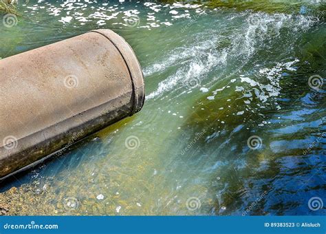 Water Flows From The Pipe Into The River Stock Image Image Of