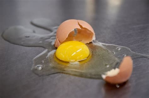 Broken Chicken Egg On The Iron Table Close Up Horizontal View A Raw