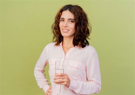 Free Photo Smiling Young Caucasian Girl Holds Glass Of Water