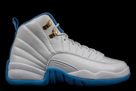 It is made from premium white leather, a white midsole and with white laces. Air Jordan 12 GS White Metallic Gold University Blue - Sneaker Bar Detroit