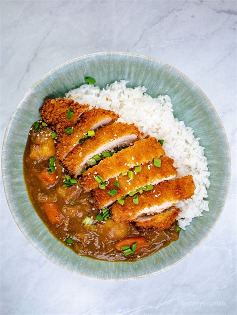 Shallow Fried Crispy And Juicy Chicken Over A Bed Of Rice And Curry Chicken Katsu Recipes