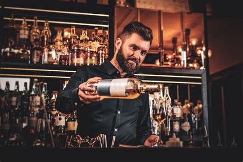 Bar Manager Is Making Drinks At The Bar Stock Photo Image Of