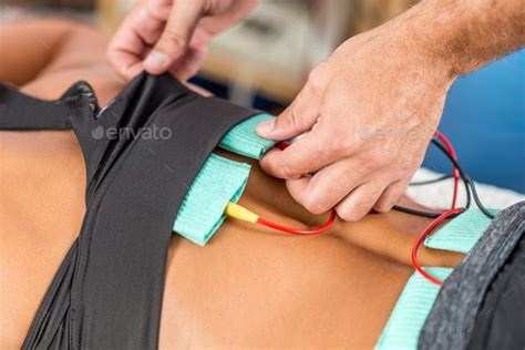 Electrical Stimulation In Physical Therapy Therapist Positionin By Microgen Electrical