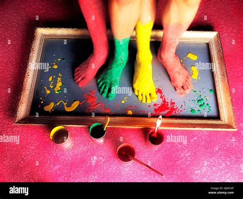 Painted Bare Feet Standing On A Picture Frame Stock Photo Alamy