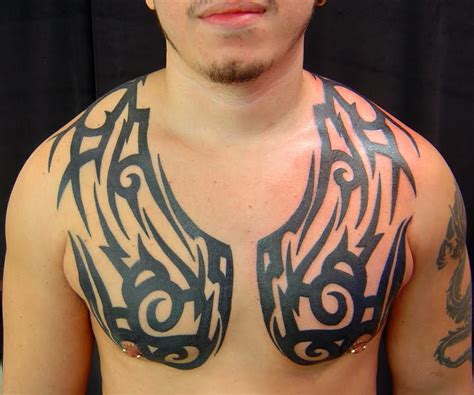 Christian men with tribal roots have popularized a mix of two identities. DESIGN TATTOO MODERN: Tribal Chest Tattoo Ideas " Tattoo ...