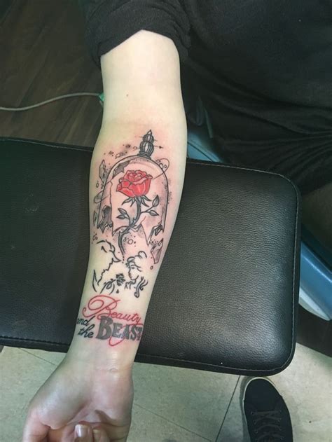 A clever little twist on a rather classic tattoo. My beauty and the beast tattoo - - #smalltattoos (With ...