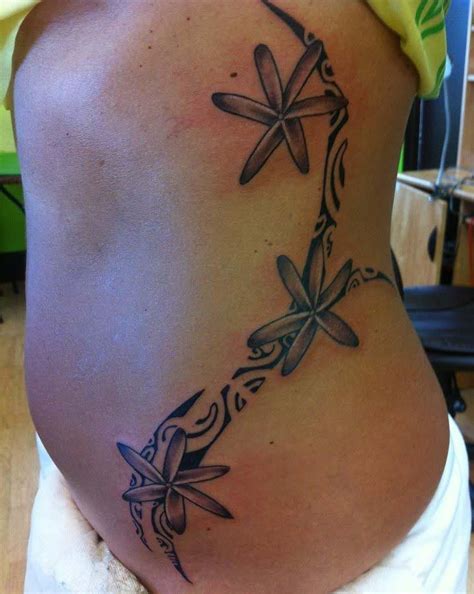 Maybe you would like to learn more about one of these? Custom Polynesian Tribal with Tiare Flowers on the ribs by Buge at Mid-Pacific Tattoo in Lahaina ...
