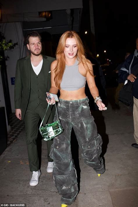 Newly Single Bella Thorne Flashes Her Taut Abs In As She Enjoys Dinner