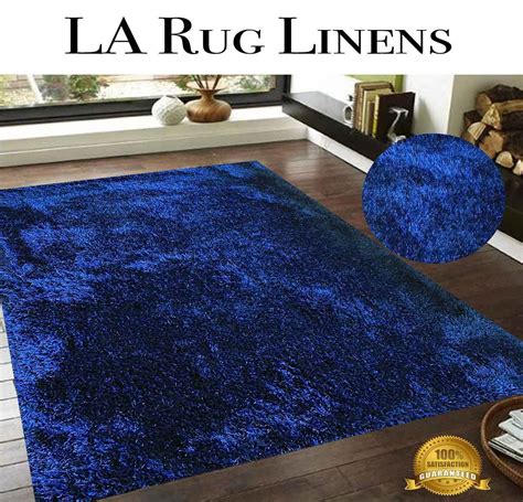 Shag rugs have a long, floppy pile, which is great fun to lie on, but a little daunting to wash. LA RUG LINENS Shimmer Shag Navy Blue Solid Modern Luster ...