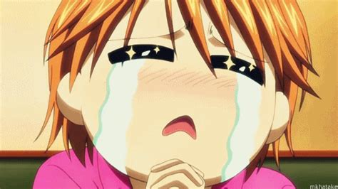 An Anime Character With Red Hair And Eyeliners Covering His Face While