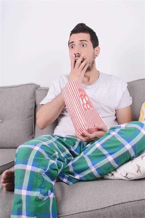 Man Eating Popcorn And Watching Movies Stock Photo Image Of Bowl