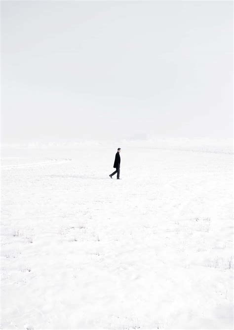 Download Desolate Snow Land Portrait Lonely Man Wallpaper