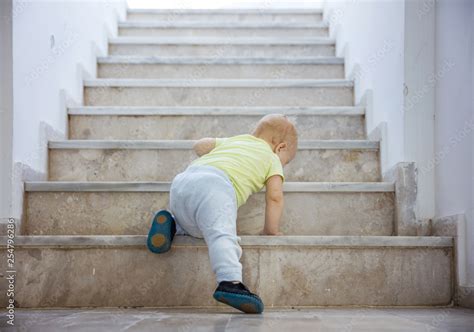 Baby Girl Crawling Up Stairs Outdoors Stock Photo Adobe Stock