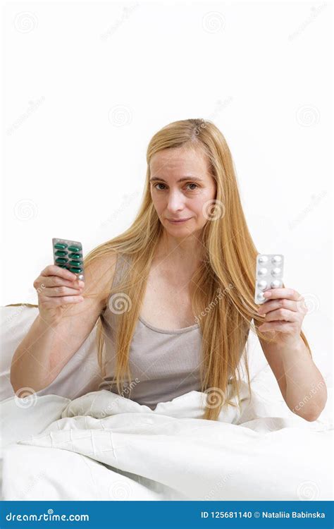Middle Age Upset Woman Real Portrait Bed Bedroom Blonde Long Hair Fifty Plus Upset 50 Fever