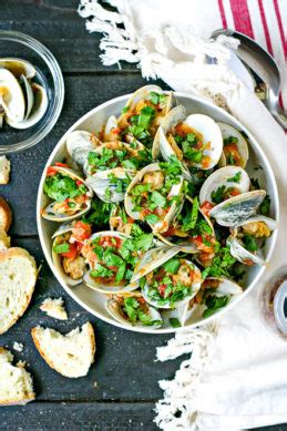 Season with red pepper flakes, salt, and pepper. Steamed Clams - EverydayMaven™