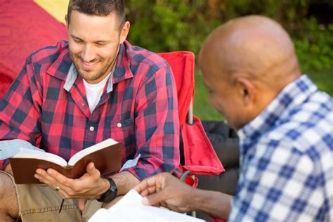 Two Guys Sharing Bible Blue Ridge Christian News