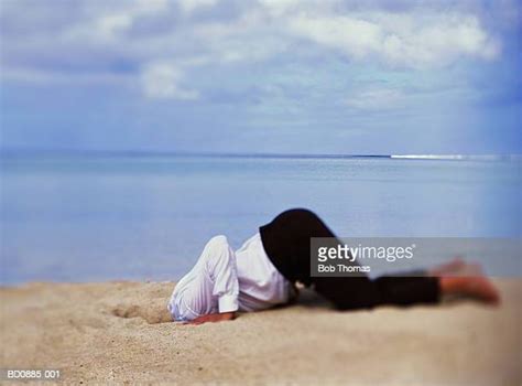 Head In The Sand Photos And Premium High Res Pictures Getty Images