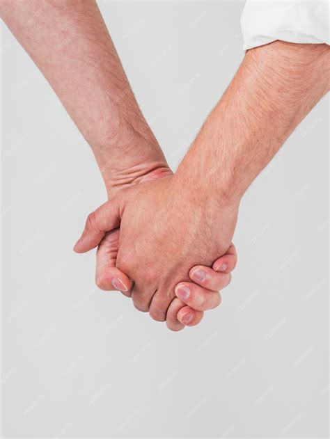 free photo close up of gay couple holding hands